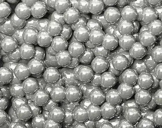 Microscopy image of rounded abrasive particles