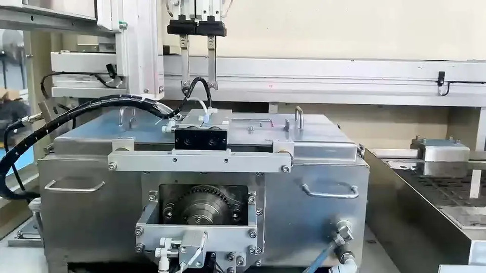 Machine fixture and hoses inside an equipment enclosure