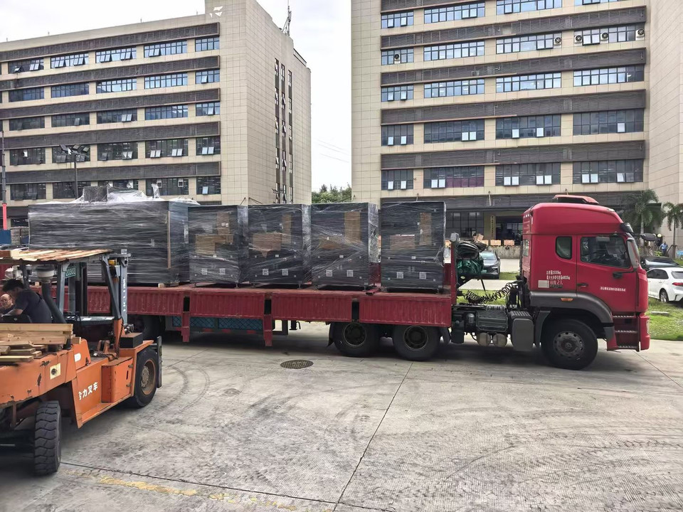 Wrapped equipment on a flatbed truck